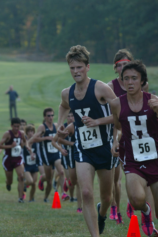 Max Walden ’11, left, was one of seven Bulldogs to finish in the top 11 against Harvard on Friday. He placed eighth.