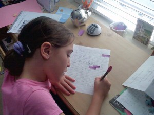 Maria Bontempo Dildine, daughter of Yale faculty member Dr. Laura Bontempo, does her homework. She is one of the few children of Yale faculty members who attend a public school.