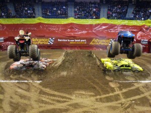 Monster Mutt, left, was one of seven monster trucks that competed in the freestyle competition of Saturday’s Monster Jam. Monster Mutt finished in second.