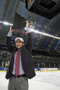 Head coach Keith Allain ’80 lifted the ECAC Tournament championship trophy on Saturday after Yale won the title.