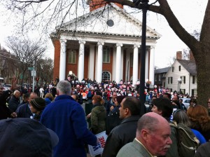 Protesters marched down Temple Street toward the New Haven Green during the “We Are One” rally on March 30.