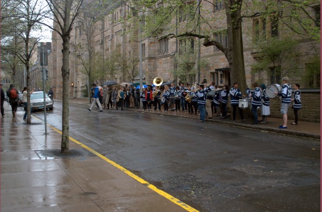 Following a memorial service honoring Michele Dufault '11, the Yale Precision Marching Band, of which Dufault had been a part, led the way to the Saybrook Master's House for a reception, pausing before entering to play a few songs in her honor.