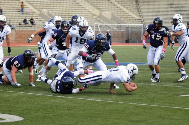 Though they held a lead heading into the fourth quarter, the Elis fell apart to lose to the Quakers, 37-25.