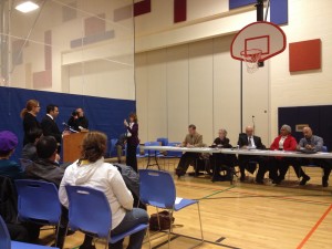 The Board of Aldermen held a public hearing about the Secure Communities program Wednesday evening in the gym of Columbus Family Academy in Fair Haven, with over 100 city residents in attendance.