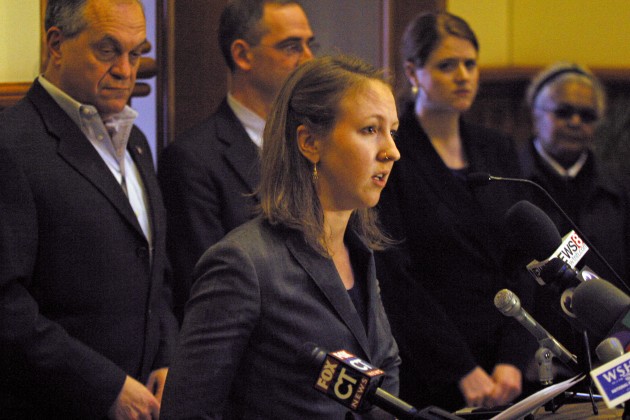 Jessica Vosburgh LAW ’13, a member of the Law School’s Worker and Immigrant Rights Advocacy clinic, joined city and state officials at City Hall Monday at a press conference urging Gov. Dannel Malloy to resist a new federal immigration enforcement program.