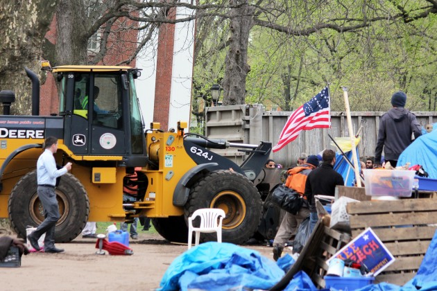 Occupy New Haven won an injunction from a federal appeals court Tuesday shortly after the city began bulldozing the encampment.