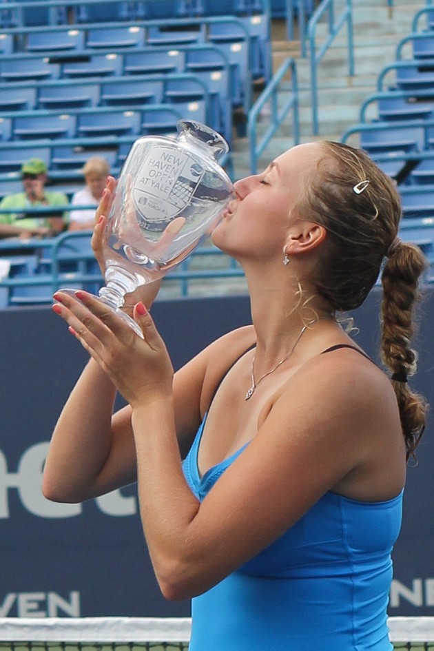 No. 2 seed Petra Kvitova kissed her trophy after she defeated No. 7 seed Maria Kirilenko 7–6(9), 7–5 in the New Haven Open final on Saturday.