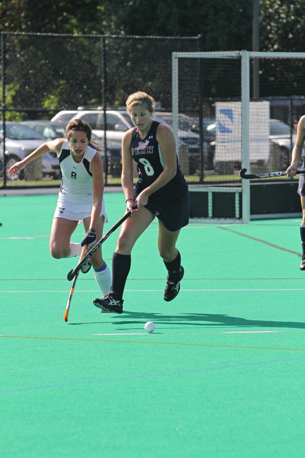 Captain and forward Maddy Sharp ’13, far right, played in all 17 games last season for the field hockey team.