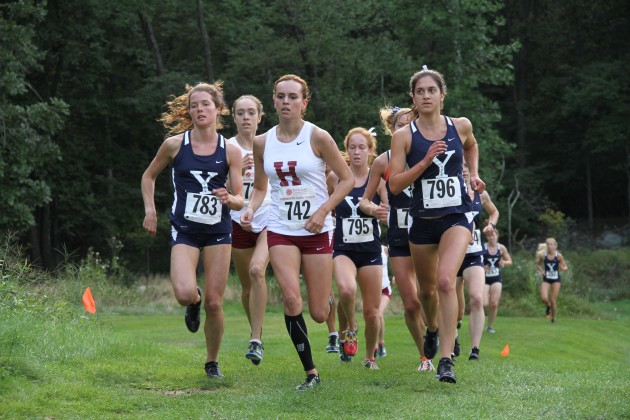 Millie Chapman ’14, left, finished fifth overall in Yale’s win over Harvard Friday. Captain Nihal Kayali ’13, right, finished third.