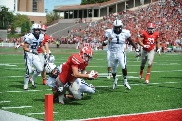 Cornell running back Luke Hagy fights for yardage near the Yale end zone on saturday. Hagy contributed two touchdowns and 157 of the Big Red’s 482 yards overall, while quarterback Jeff Matthews threw for 340 yards and four scores.