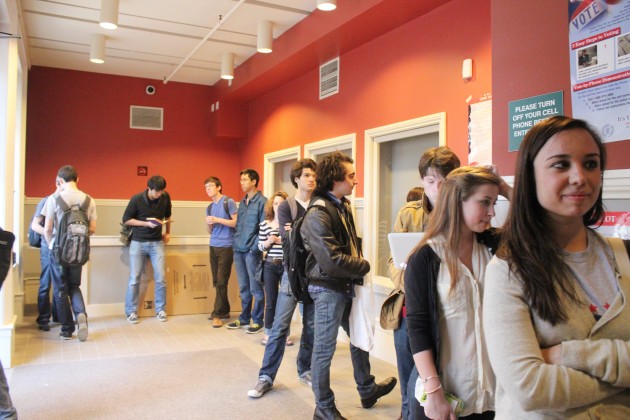 Yale students wait to vote in the 2011 elections. High voter turnout in New Haven can impact this year’s Senate race..