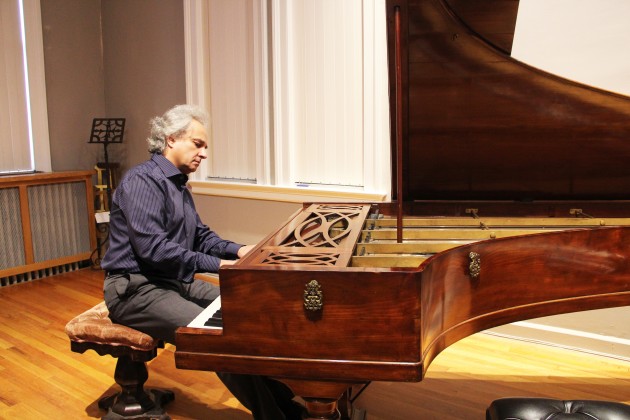 Celebrated French pianist Yves Henry played selections from Chopin and Debussy on two historical pianos in a sold-out Sunday exhibition.