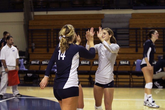 Libero Maddie Rudnick ’15, right, tallied 25 digs in Friday’s 3–1 win over Columbia. Rudnick is third in the Ivy League with 4.7 digs per set.