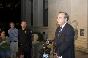 University President Richard Levin addresses reporters late Sunday outside Woodbridge Hall.