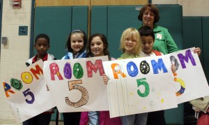Students at Edgewood Magnet School observe International Walk to School Day. Due to rain, the event took place primarily in the school's cafeteria.