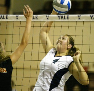 Outside hitter Alexis Crusey '10 spikes the ball in the Elis' 3-0 home victory over Princeton on Friday.