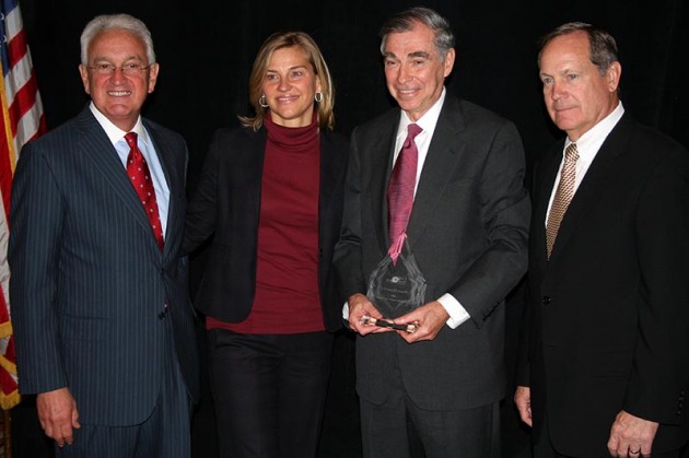 Bruce Alexander ’65, second from right, was recognized at a chamber of commerce luncheon Thursday.