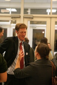 Democrat Justin Elicker FES ’10 SOM ’10 talks with the audience after his victory was announced.