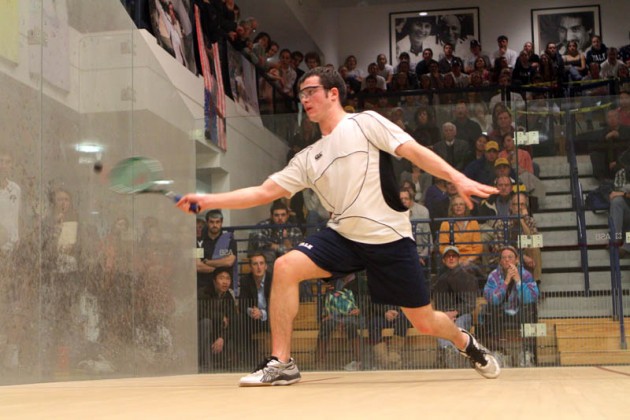 Hywel Robinson ’13 forehands a ball against Trinity Wednesday night.