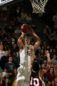 Forward Mike Sands ’11 takes a jumper against Brown on Jan. 15. Sands scored seven points in Friday’s win over the Bears.