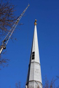 A crane was on Hillhouse Avenue on Friday to fix damage to the steeple of St. Mary's Church. The street was also closed to pedestrian traffic.