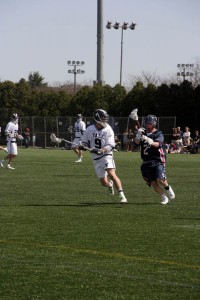 Matt Fuchs ’10 looks to get past a Penn defender during Yale’s win over the Quakers on April 3.