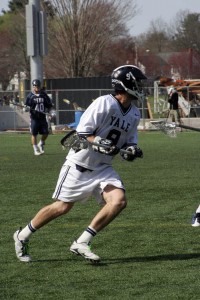 Matt Fuchs ’10 looks to get past a Penn defender during Yale’s 16–14 win over the Quakers on April 3. The Elis won their third straight Ivy matchup Saturday.