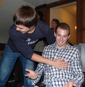 Jeff Gordon ’12 and his friends react to the news that he will enter a runoff for YCC president on Thursday.