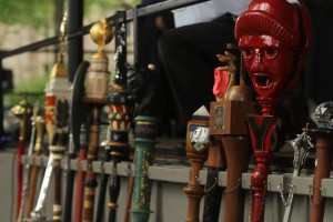 Exotic maces, riffing on the traditional Commencement accoutrements, line the stage at Monday's ceremony.