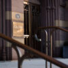 Looking across the stairs leading up to the front doors of City Hall