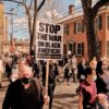 Protesters march east on Wall St. in between Silliman and Slifka.