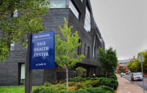 An up close photo of the Yale Health Center sign sign