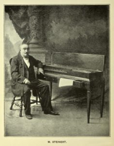 Morris Steinert at one of his clavichords.