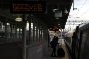 A passenger boards a train on Union Station