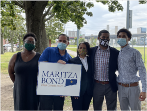 Supporters gather with city Director of Health Maritza Bond at her Wednesday afternoon committee launch.