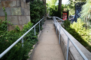 A photo of the accessibility ramp at the front of the University Theater